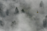 A Penkenbahn gondola ascending into the mist