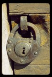 Several hundred year old lock on worn church door
