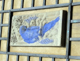 A plaque on the outside wall