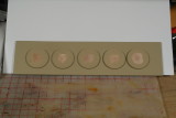 Concrete base of styrene and wooden nickels