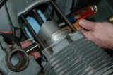 Remove wristpin.