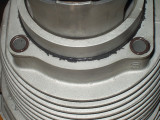 Small o-rings seal top cylinder studs.