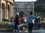 Arch of Constantine overlooks a lively scene.