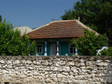 House and stone wall in Butuceni