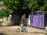 Little boy on the dirt road