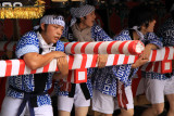 Young men pulling the float