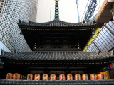 Temple crammed between modern buildings