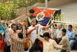 Mark dancing on the street at border ceremony.jpg