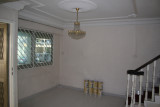 Before: Sitting Area to left of front door