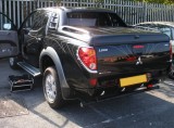 BLACK L200 ANIMAL DID REAR 07 REG.jpg