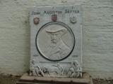 This plaque contains a likeness of John Augustus Sutter & honors the centeniall of the founding of the fort.
