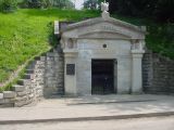 This is the vault, which is located behind the present-day memorial.