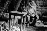 Jose Dominguez Shucking Corn