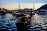 Sampan at sunset.  Aberdeen Typhoon Shelter, Hong Kong