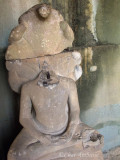Headless Buddha at Angkor Wat Temple