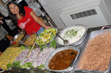 IMG_3595 Carla poses with the food for SUPC Dinner