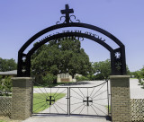 Sacred Heart Catholic Cemetary entrance looking toward the church.