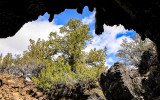 View through entrance of Paradise Alley Cave in Lava Beds National Monument