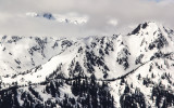 Mount Olympus through a hole in the clouds along Hurricane Ridge in Olympic National Park