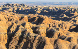 Light from the setting sun on the landscape in Badlands National Park