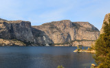 Looking across the Hetch Hetchy Valley Reservoir at Wapama Falls and Hetch Hetchy Dome in Yosemite National Park