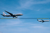 May 2002 - American B777-223/ER N797AN and B727-223Adv N864AA flying in formation airline aviation stock photo