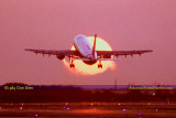 1984 - Eastern Airlines Airbus A-300 taking off in front of the setting sun at Miami International Airport