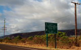 Turnoff sign for the U. S. Navy Pacific Missile Range Facility Barking Sands on the south side of Kauai, Hawaii