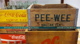 An old case of Pee Wee sodas that were brewed in and distributed from Hialeah on display at the Burger Museum in Miami