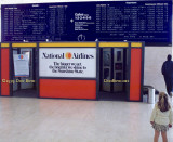 1979 - 3-year old Karen looking at the dynamic National Airlines flight information board at JFK