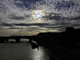 Setting Sun over the River Thames, London, England.