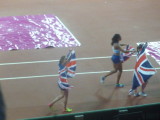 GB women celebrating silver medals after 4x400