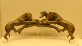  Bronze basin handles depicting lions devouring a stag