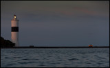 Långe Jan Lighthouse and wind-shield in suset