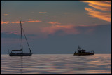 Rescue Boat Väringen towing a sailing vessel with engine problems - Grönhögen