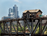 Abandoned Bridge Tenders Shack With Downtown Chicago In Background.