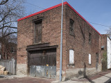 1880s carriage house in process of restoration, conversion