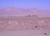 The copper is transported by train from Chuquicamata to Antofagasta (here it seems to be another marchandise). 