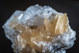 Barytocalcite, honey brown monoclinic crystals to 15 m on 55 mm witherite matrix. Nentsberry Haggs Mine, Alston Moor, Cumbria.