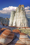 Tower of Cow Springs Sandstone with Entrada Formation boulders, Blue Canyon , AZ