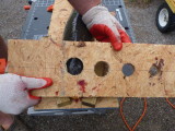 Closeup of hole saw guide. 