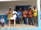 Class with jars of canned tilapia
