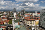 Elevated view of Ljubljana capital city of Slovenia north from the Skyscraper to the Kamnik Savinja Alps under clouds