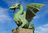 Roaring winged dragon sculpture of green sheet copper symbol of Ljubljana Capital city of Slovenia on the Dragon Bridge over the