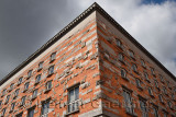 Corner of National and University Library of Slovenia in Ljubljana designed by architect Joze Plecnik with red brick and stone e