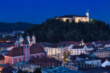 Hlltop Ljubljana Castle overlooking the old town of Ljubljana capital city of Slovenia with Franciscan church and St Nicholas Ca