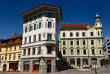 Historic Art Nouveau buildings at Preseren Square white tiled Hauptmann House 1873 left and green Frisch house 1897 Ljubljana Sl