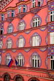 Brightly colored facade of Cooperative Business Bank Building or Vurnik House by Ivan Vurnik 1921 painted by wife Helena in Ljub