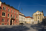Morning blue sky at empty Congress Square with Ursuline Church of the Holy Trinity classic architecture in Ljubljana Slovenia