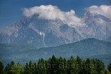Cloud covered Jezersko Combe and Grintovec highest mountain peak of the Kamnik Savinja Alps Karawanks range of Slovenia near Lju